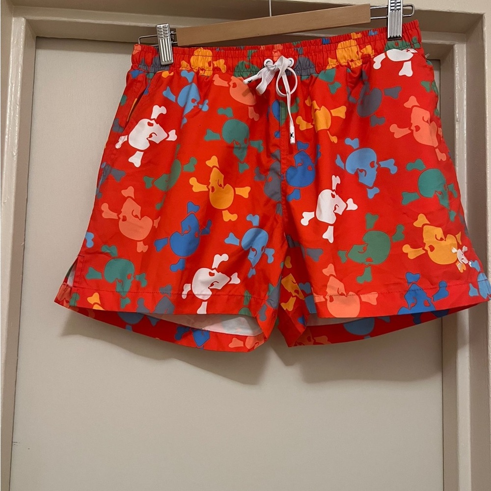 Skull And Bones Orange Tossed Skull Swim Trunks
